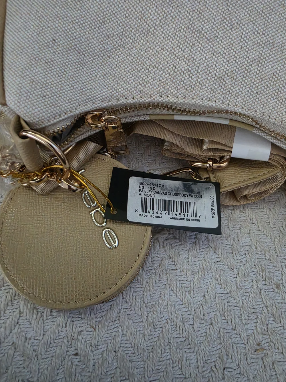 bebe Paisley Canvas Crossbody Bag with Coin Purse in the Almond